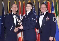 Accepting 52 FW Airman of the Year award for base.